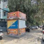 Premium advertising space at Mall Road Crossing Police Booth